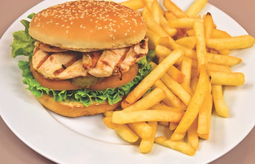 Charbroiled chicken burger with fries