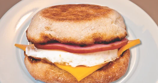 Ham and egg muffin with melted cheese