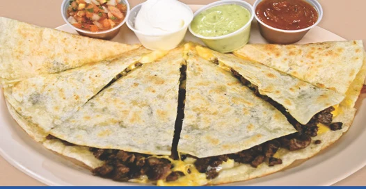 Carne asada quesadilla with salsas